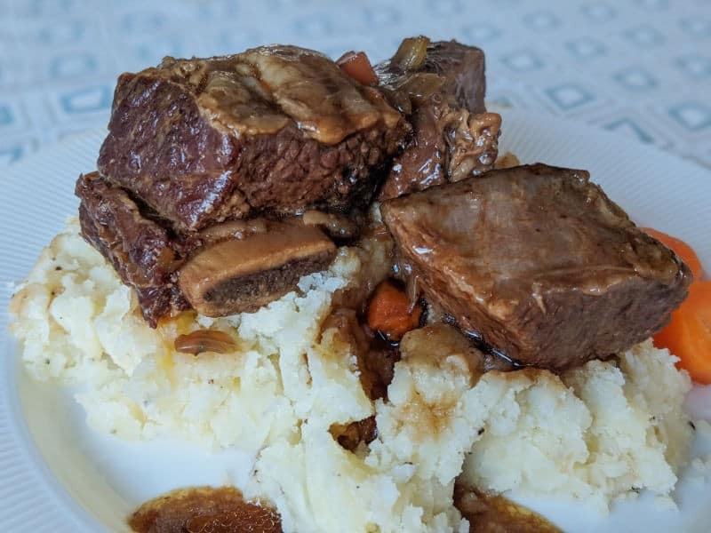 delicious short beef ribs with potatoes image